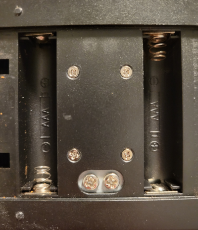 Open back of a broken kitchen scale